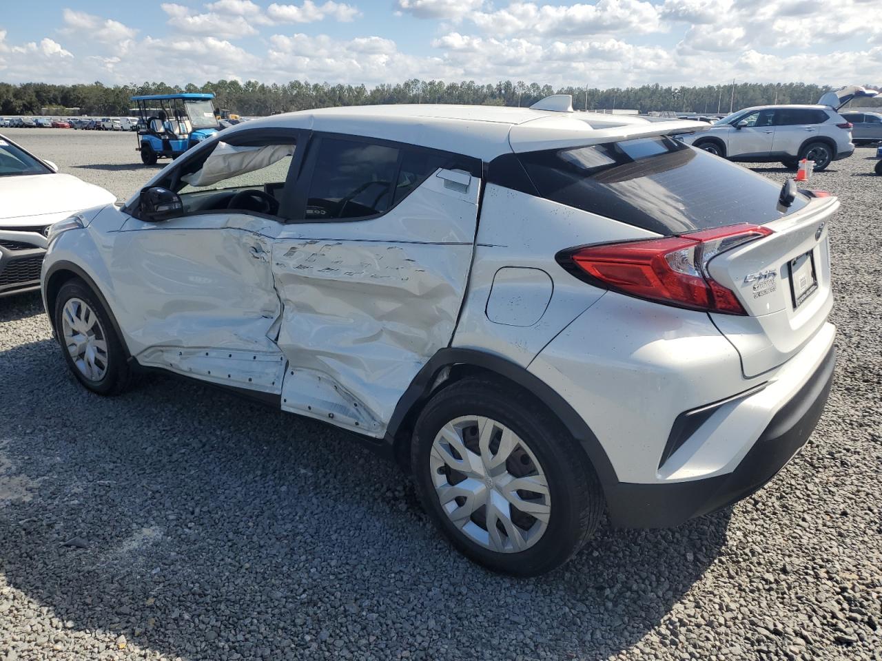 2021 Toyota C-HR VIN NMTKHMBX9MR120674 Copart auction photo, side damage thumbnail 2
