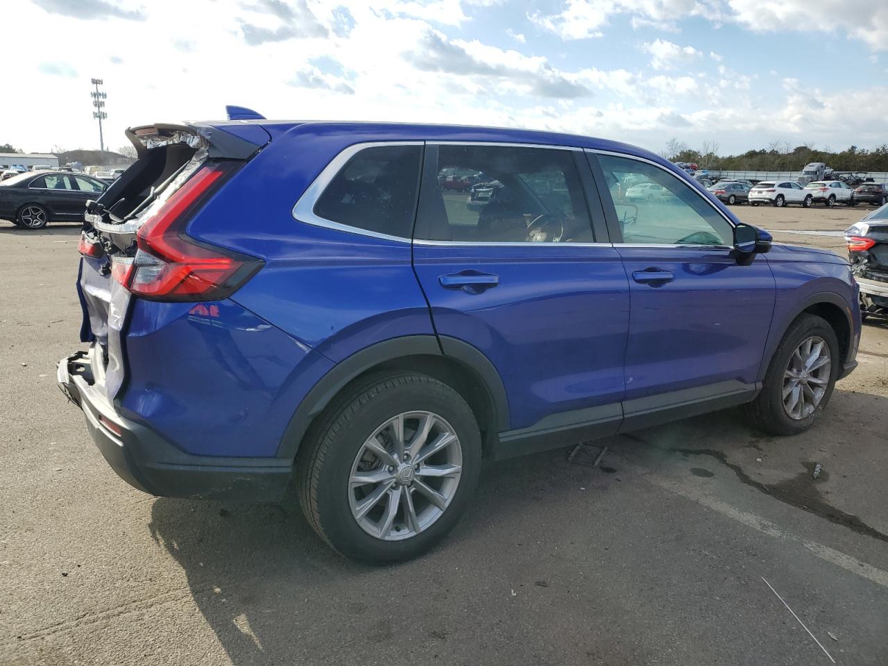 2023 Honda CR-V VIN 7FARS4H47PE009049 Copart auction photo, rear end / minor dent/scratches damage thumbnail 3