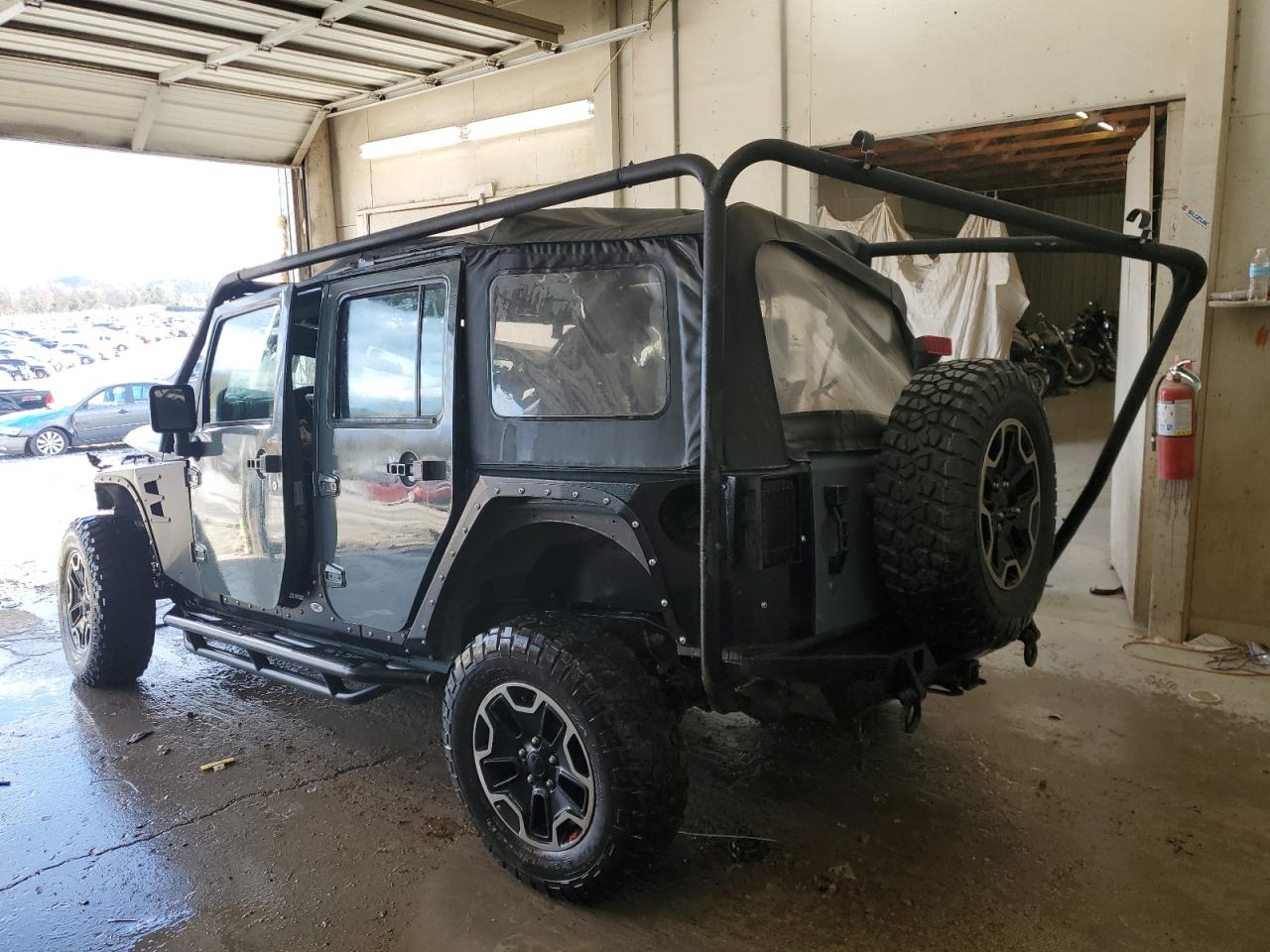 2015 Jeep Wrangler VIN 1C4BJWDG2FL734792 Copart auction photo, all over damage thumbnail 2