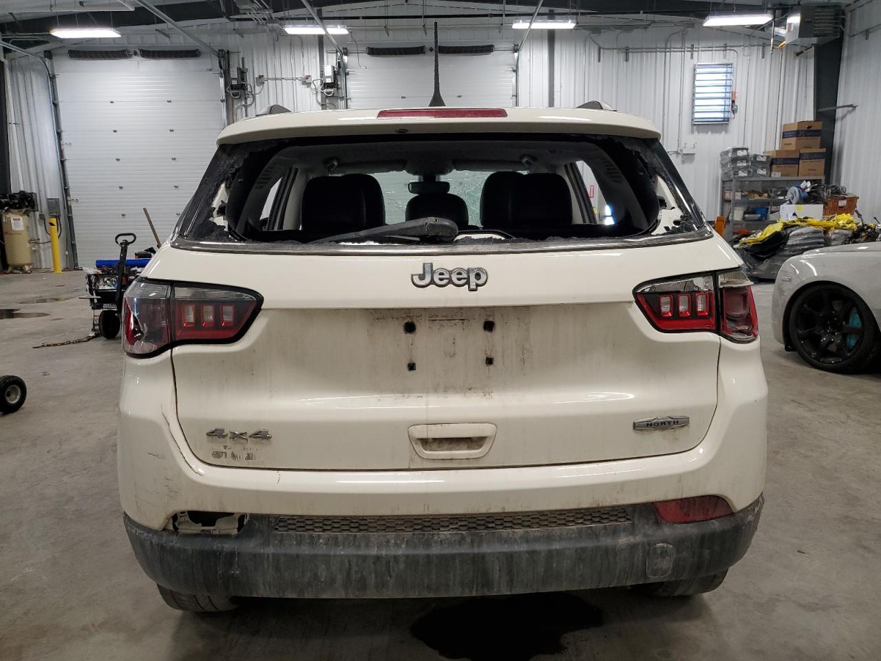 2018 Jeep Compass VIN 3C4NJDBB8JT145767 Copart auction photo, vandalism / water/flood damage thumbnail 6