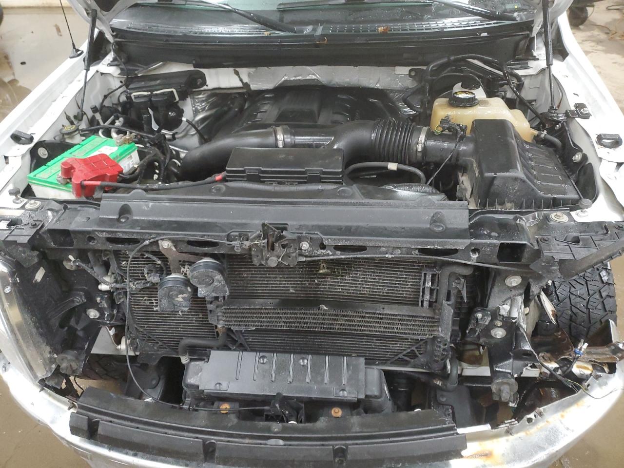 2012 Ford F-150 VIN 1FTFW1ET7CFC54758 Copart auction photo, undercarriage / all over damage thumbnail 11