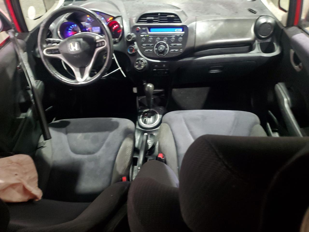 2012 Honda Fit VIN JHMGE8H56CC019765 Copart auction photo, side / front end damage thumbnail 8