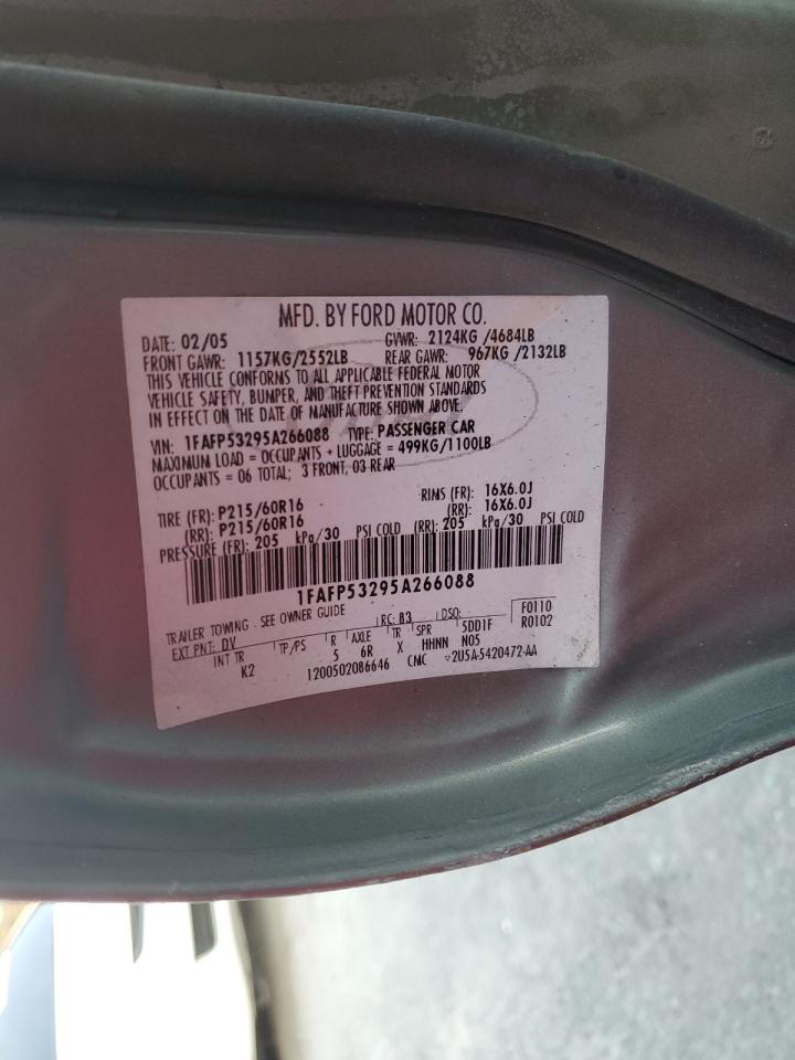 2005 Ford Taurus VIN 1FAFP53295A266088 Copart auction photo, burn damage thumbnail 12