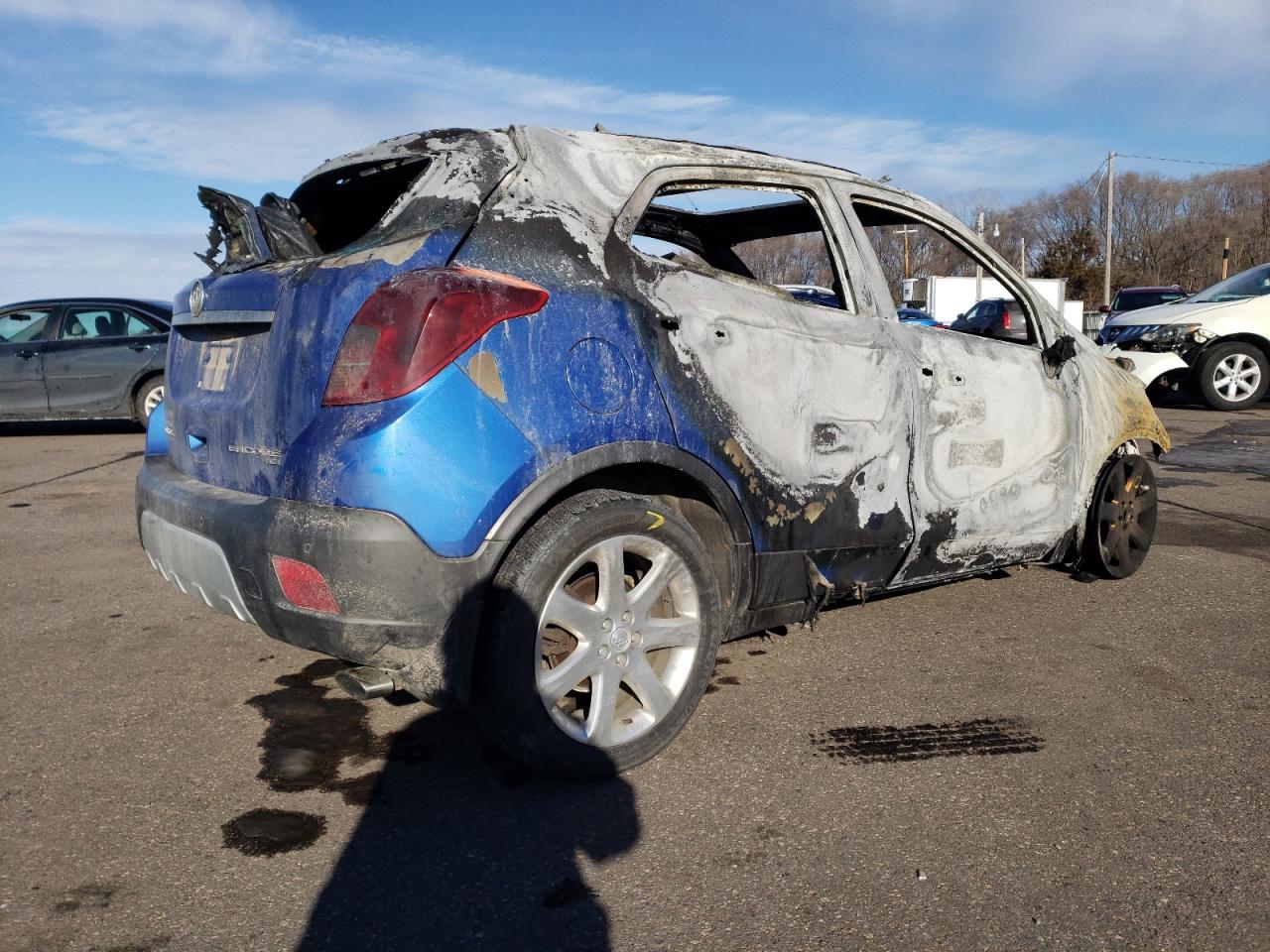 2015 Buick Encore VIN KL4CJHSB7FB258997 Copart auction photo, burn damage thumbnail 3