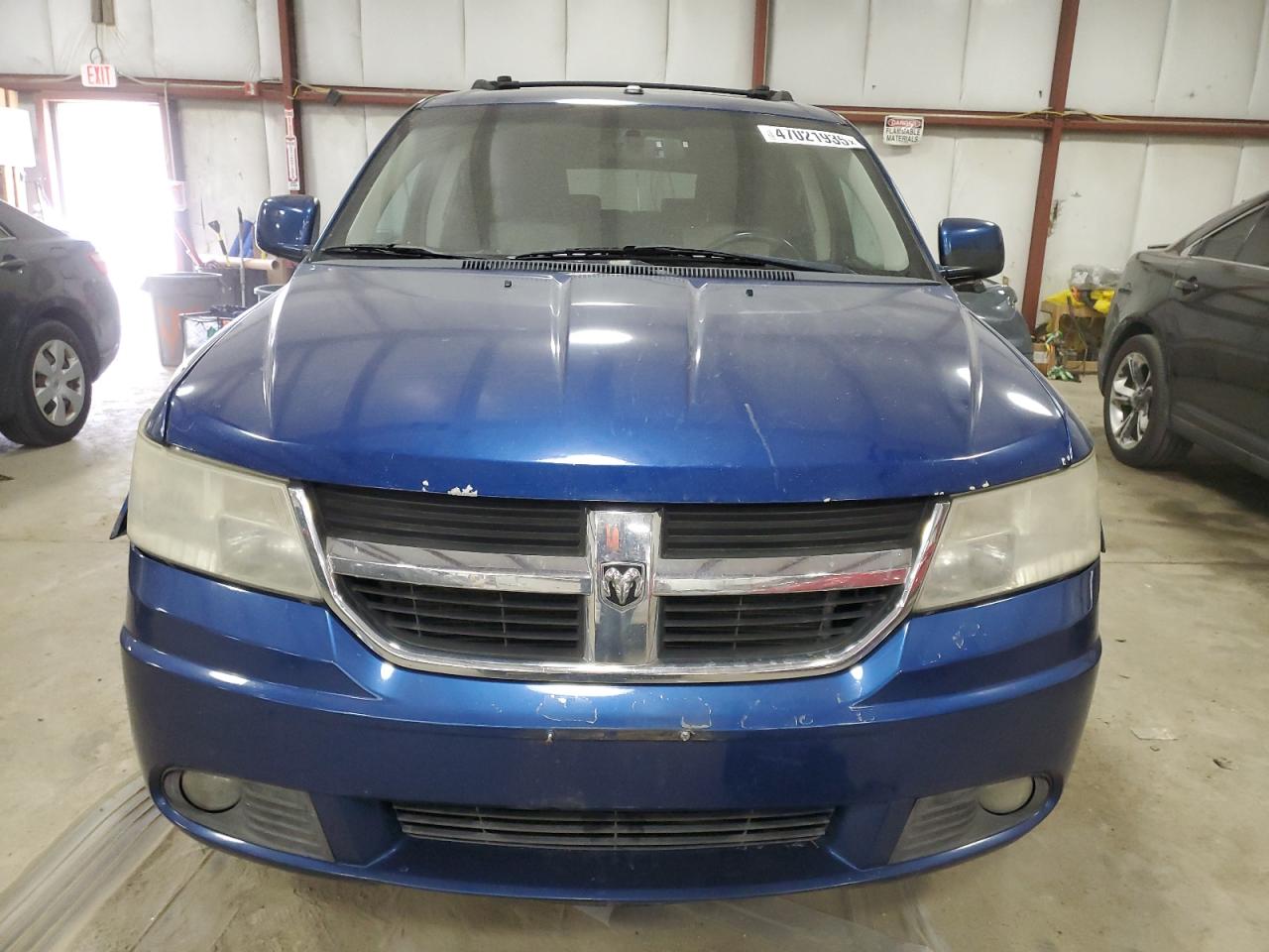 2009 Dodge Journey VIN 3D4GH57V29T574754 Copart auction photo, side / front end damage thumbnail 5