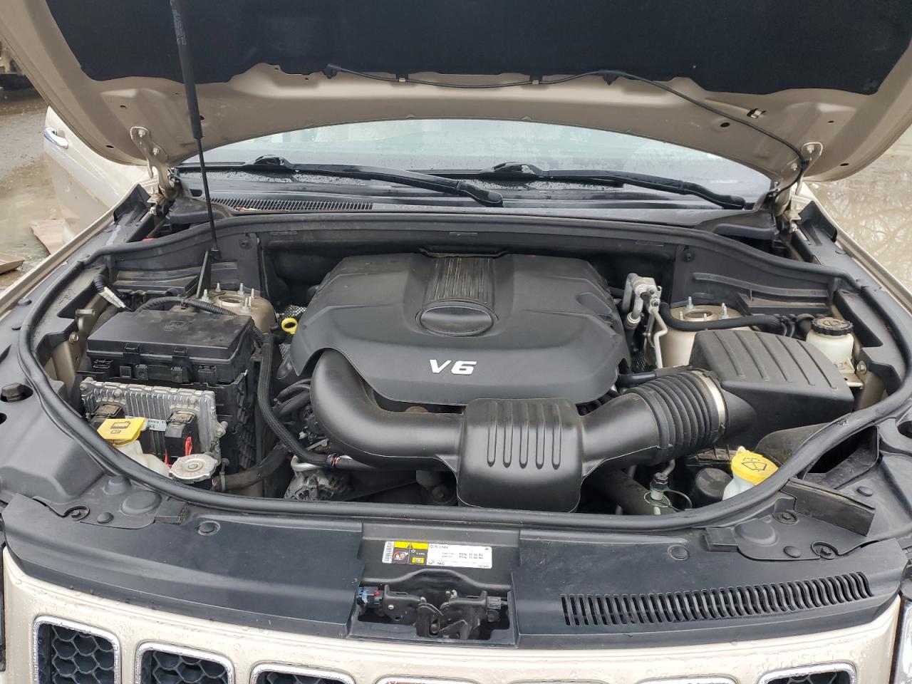 2014 Jeep Grand Cherokee VIN 1C4RJECGXEC522053 Copart auction photo, side / rear end damage thumbnail 13