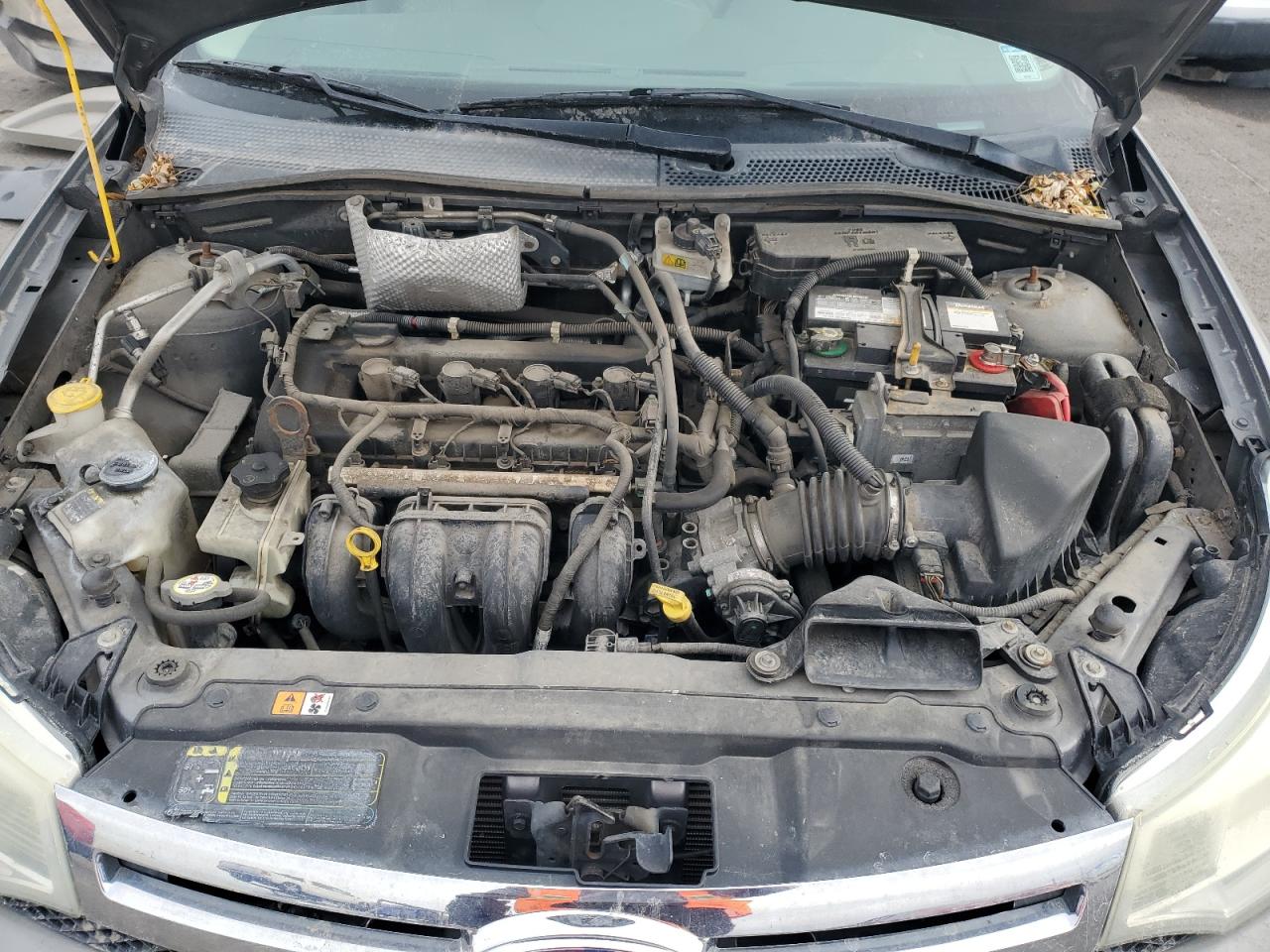2009 Ford Focus VIN 1FAHP37N79W116961 Copart auction photo, all over damage thumbnail 11