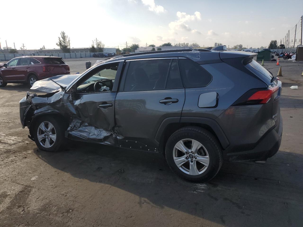 2020 Toyota RAV 4 VIN 2T3W1RFV0LC076088 Copart auction photo, side / front end damage thumbnail 2