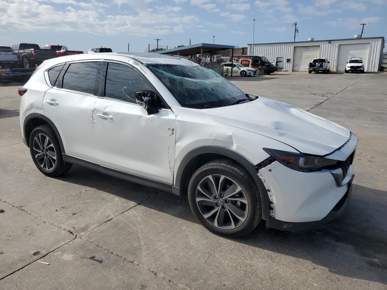 2022 Mazda CX-5 VIN JM3KFBDM8N0627768 Copart auction photo, all over damage thumbnail 4
