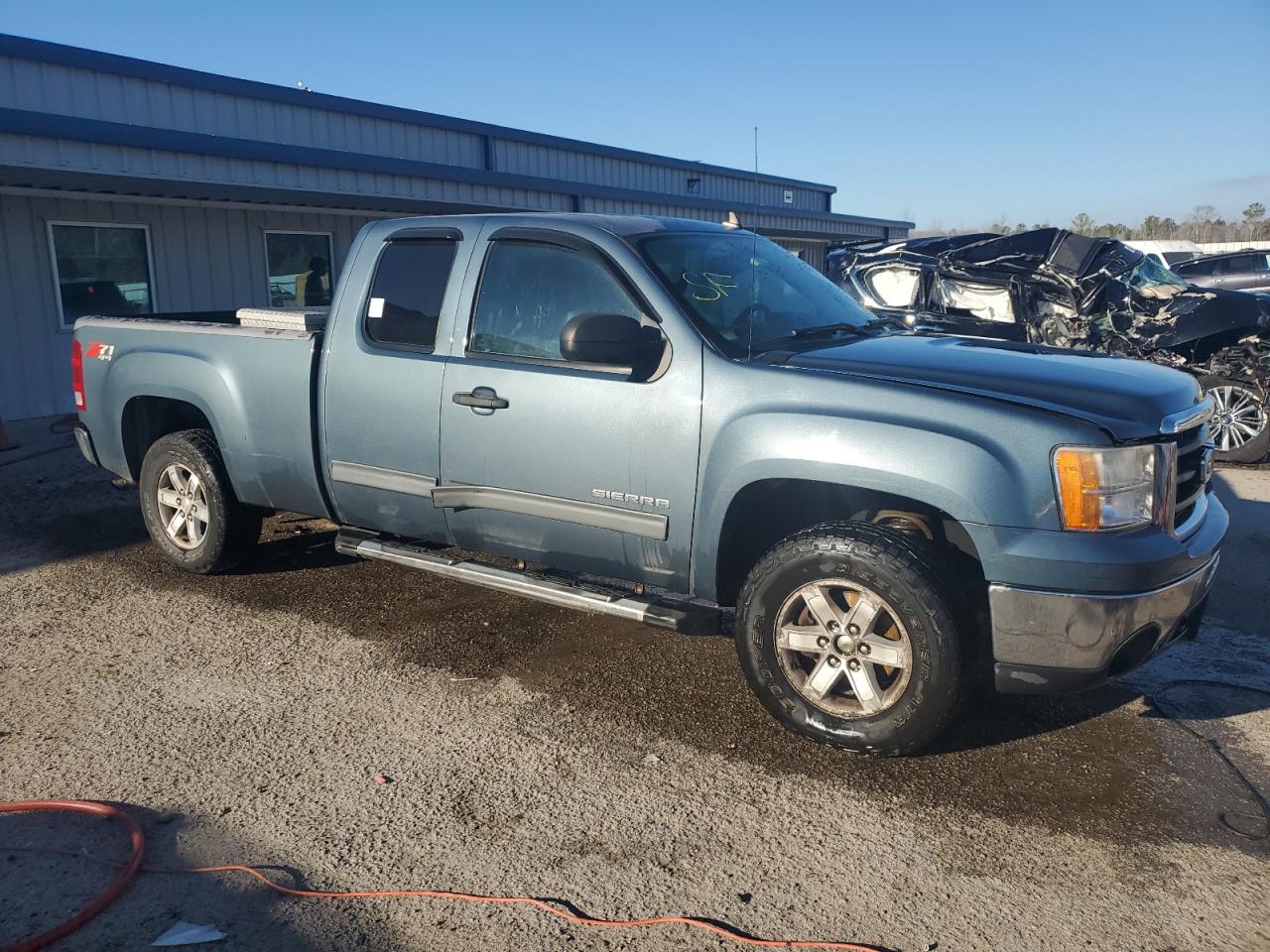 2011 GMC Sierra VIN 1GTR2VE38BZ303771 Copart auction photo, side damage thumbnail 4