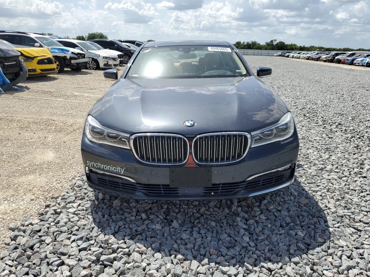 2017 BMW 7er VIN WBA7F2C54HG422160 Copart auction photo, side / front end damage thumbnail 5
