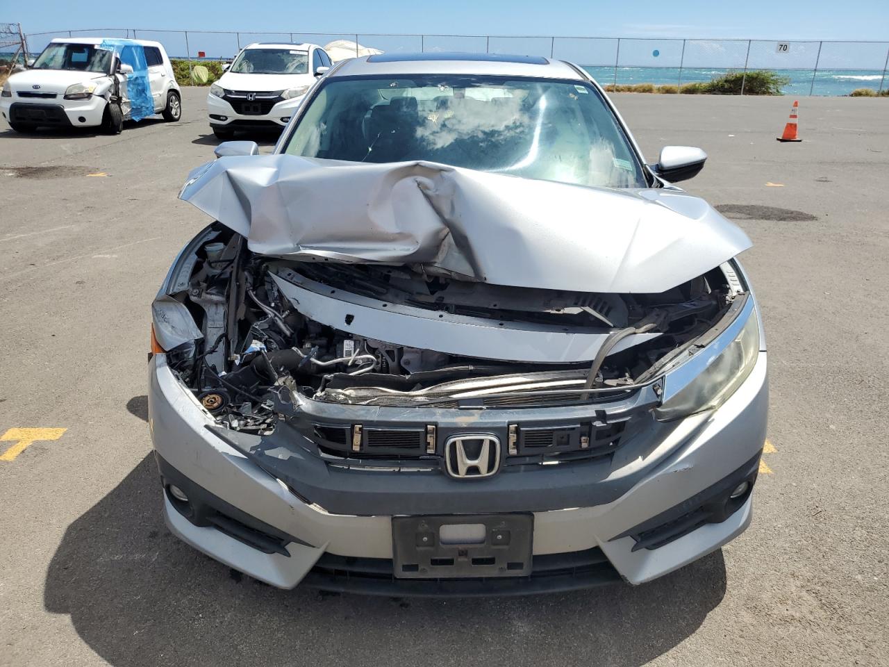 2016 Honda Civic VIN 2HGFC1F31GH651556 Copart auction photo, front end / side damage thumbnail 5