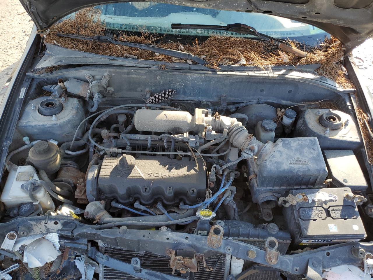 2002 Hyundai Accent VIN KMHCF35G22U174792 Copart auction photo, all over damage thumbnail 12