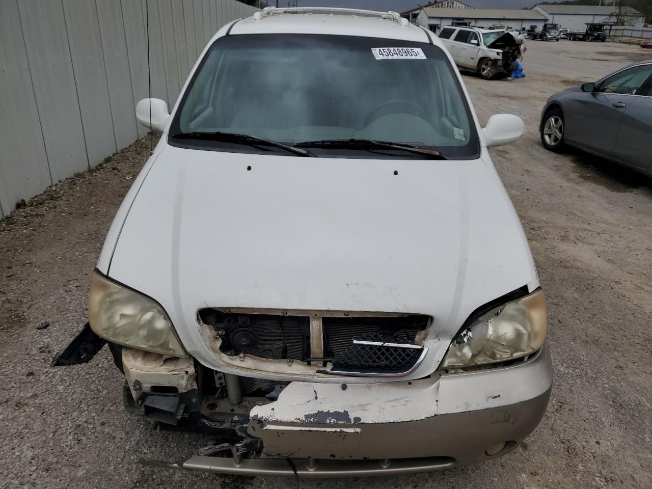 2005 KIA Sedona VIN KNDUP132856716570 Copart auction photo, front end damage thumbnail 5
