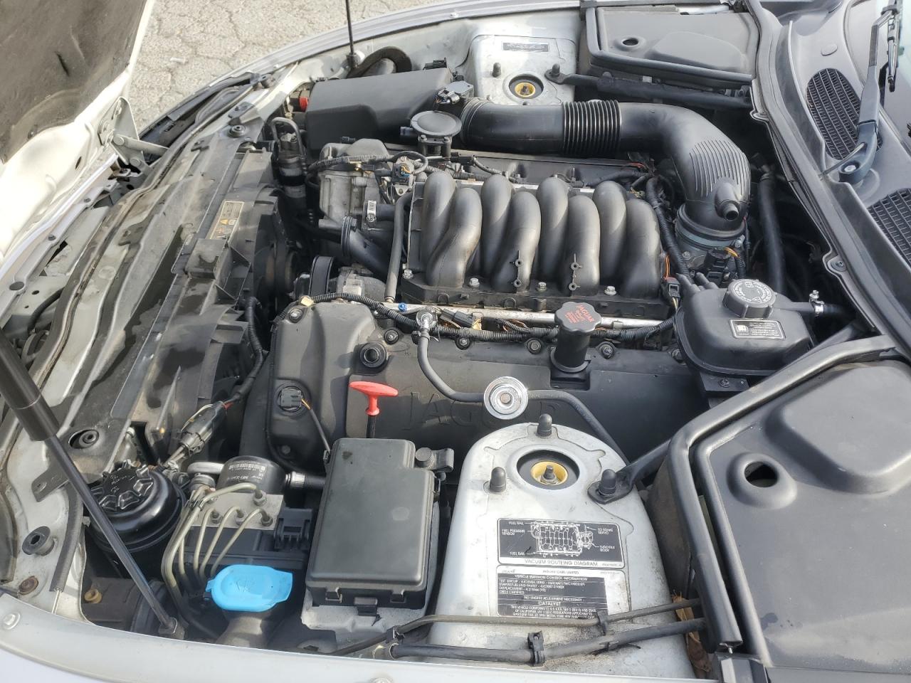 2004 Jaguar XK VIN SAJDA42C442A37967 Copart auction photo, minor dent/scratches damage thumbnail 11