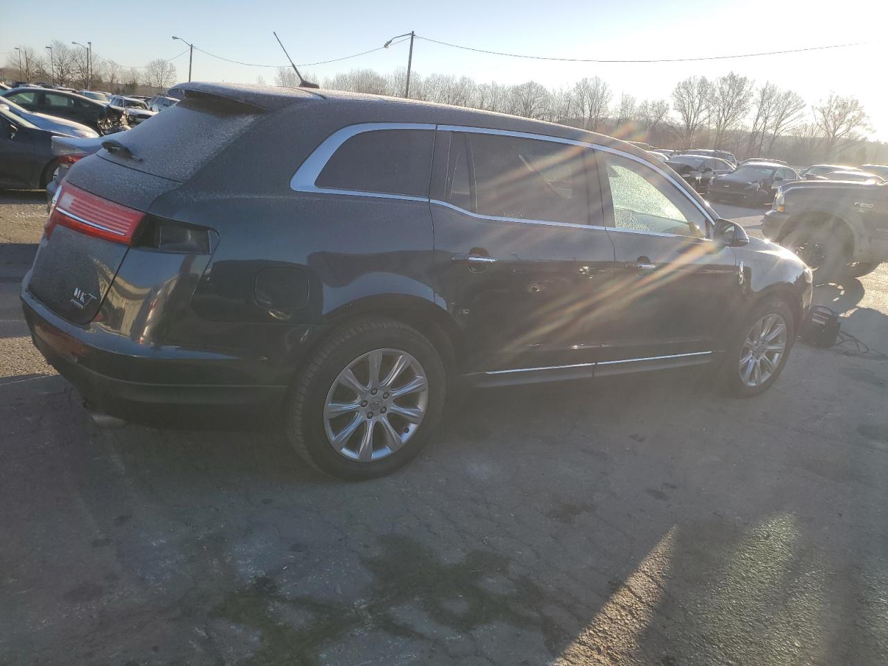 2014 Lincoln MKT VIN 2LMHJ5AT7EBL53766 Copart auction photo, rear end damage thumbnail 3