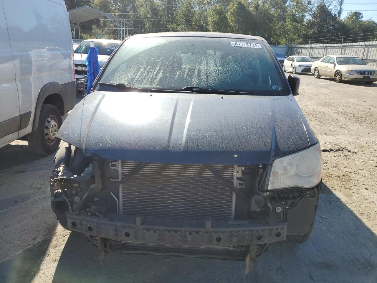 2014 Dodge Caravan VIN 2C4RDGBGXER452775 Copart auction photo, front end damage thumbnail 5