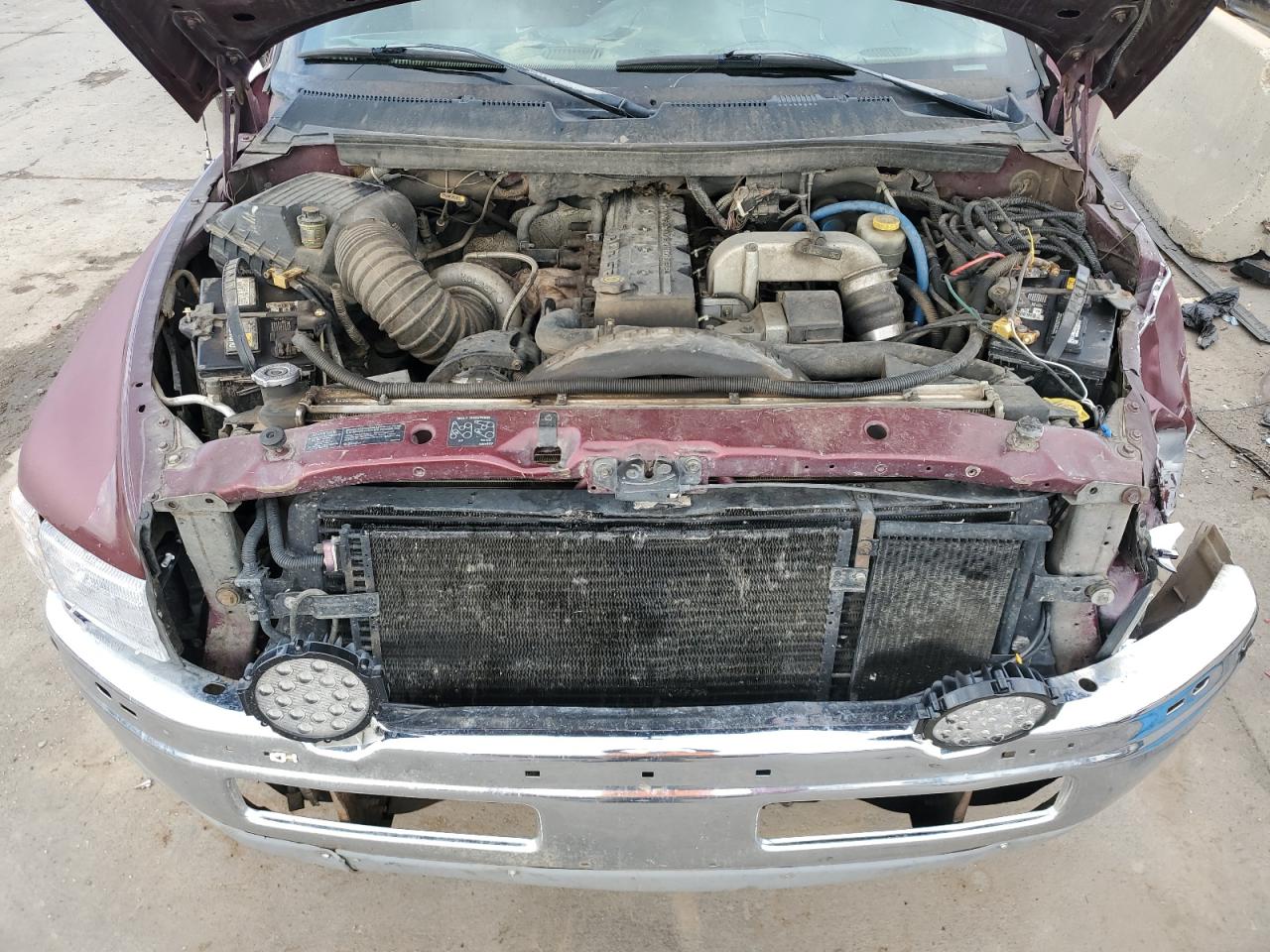 2000 Dodge RAM VIN 3B7KF2368YG140680 Copart auction photo, front end / rear end damage thumbnail 11
