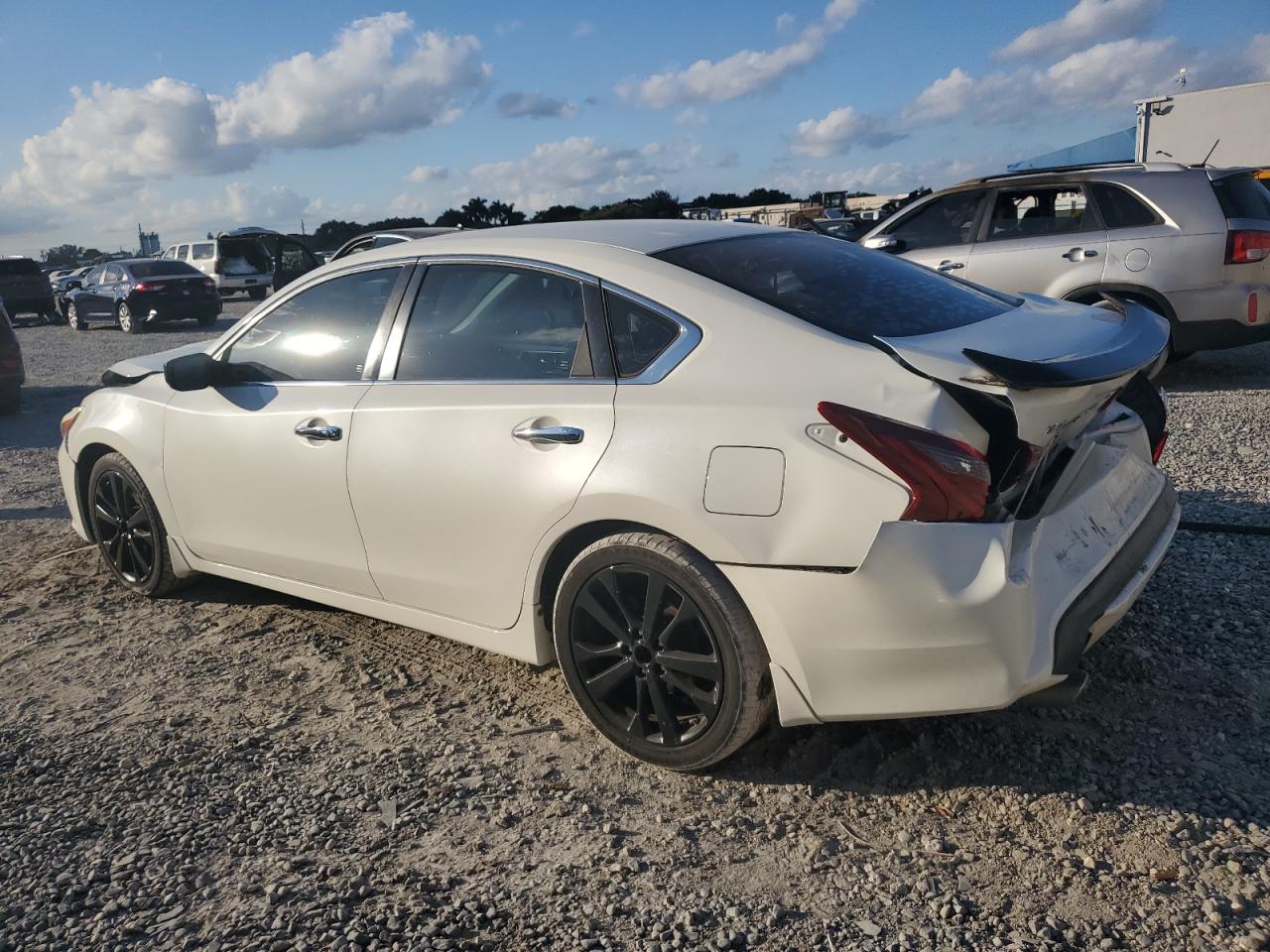 2017 Nissan Altima VIN 1N4AL3AP6HN359947 Copart auction photo, front end / rear end damage thumbnail 2
