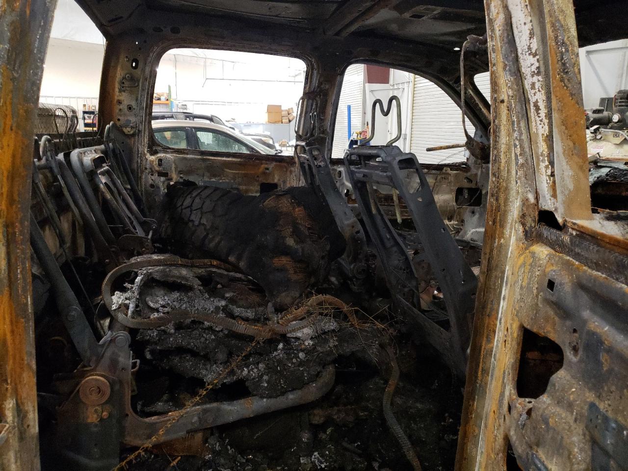 2010 Chevrolet Silverado VIN 1GC4KXBG0AF140692 Copart auction photo, burn / rear end damage thumbnail 10