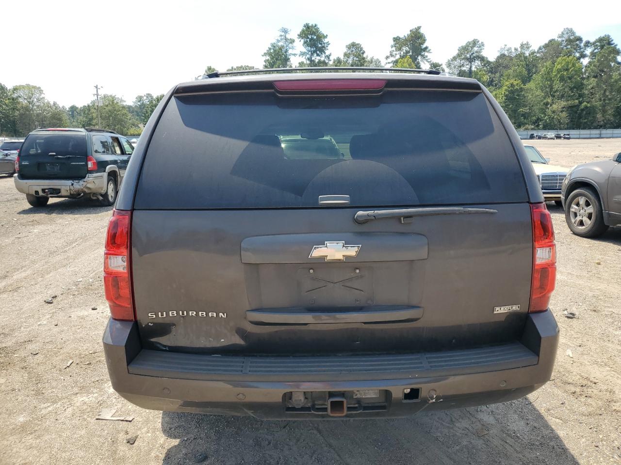 2010 Chevrolet Suburban VIN 1GNUCJE08AR282271 Copart auction photo, all over damage thumbnail 6