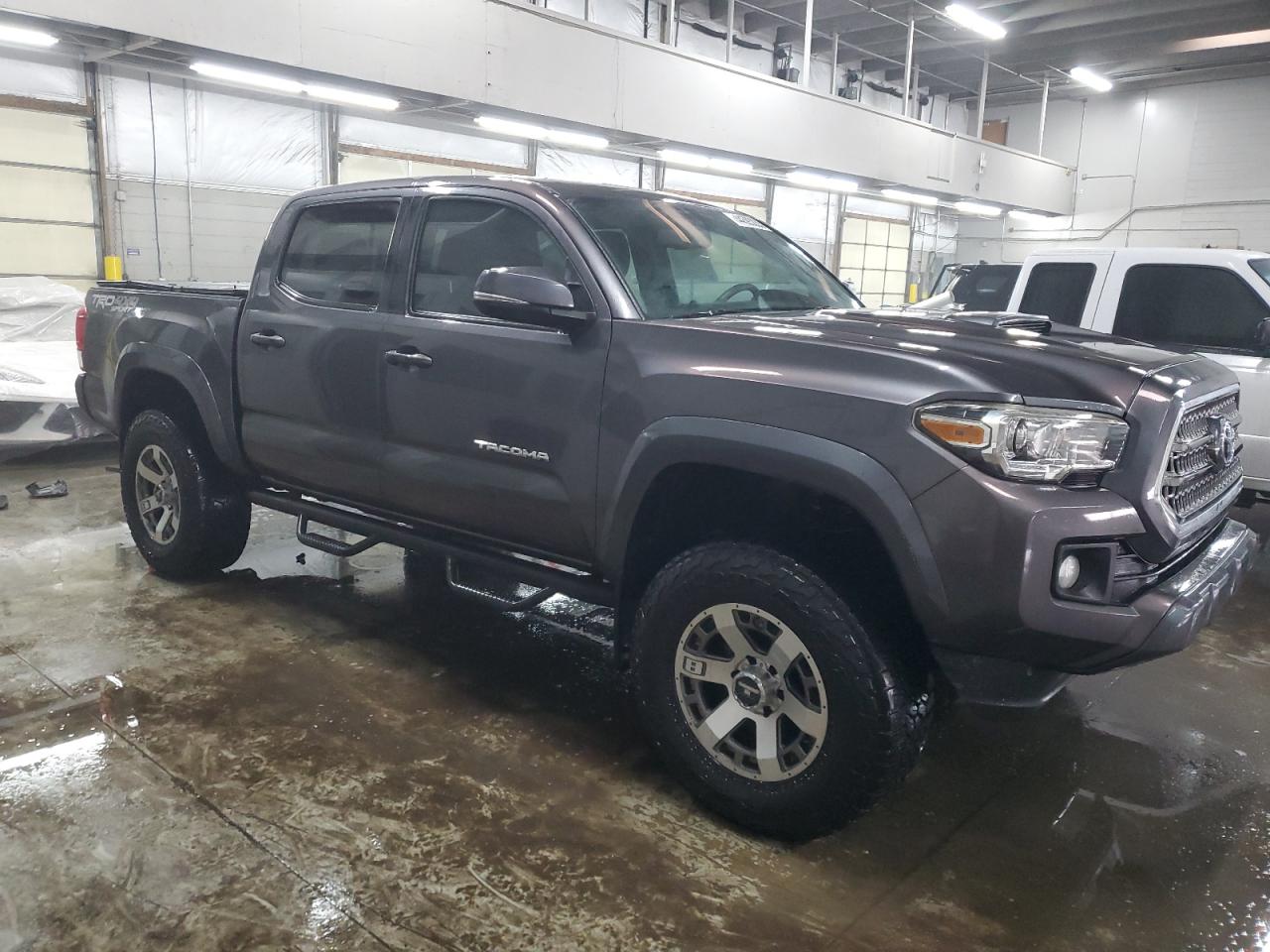 2017 Toyota Tacoma VIN 5TFCZ5AN9HX100529 Copart auction photo, rear end / hail damage thumbnail 4
