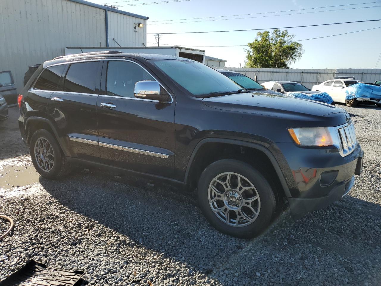 2013 Jeep Grand Cherokee VIN 1C4RJFCG2DC653207 Copart auction photo, side damage thumbnail 4
