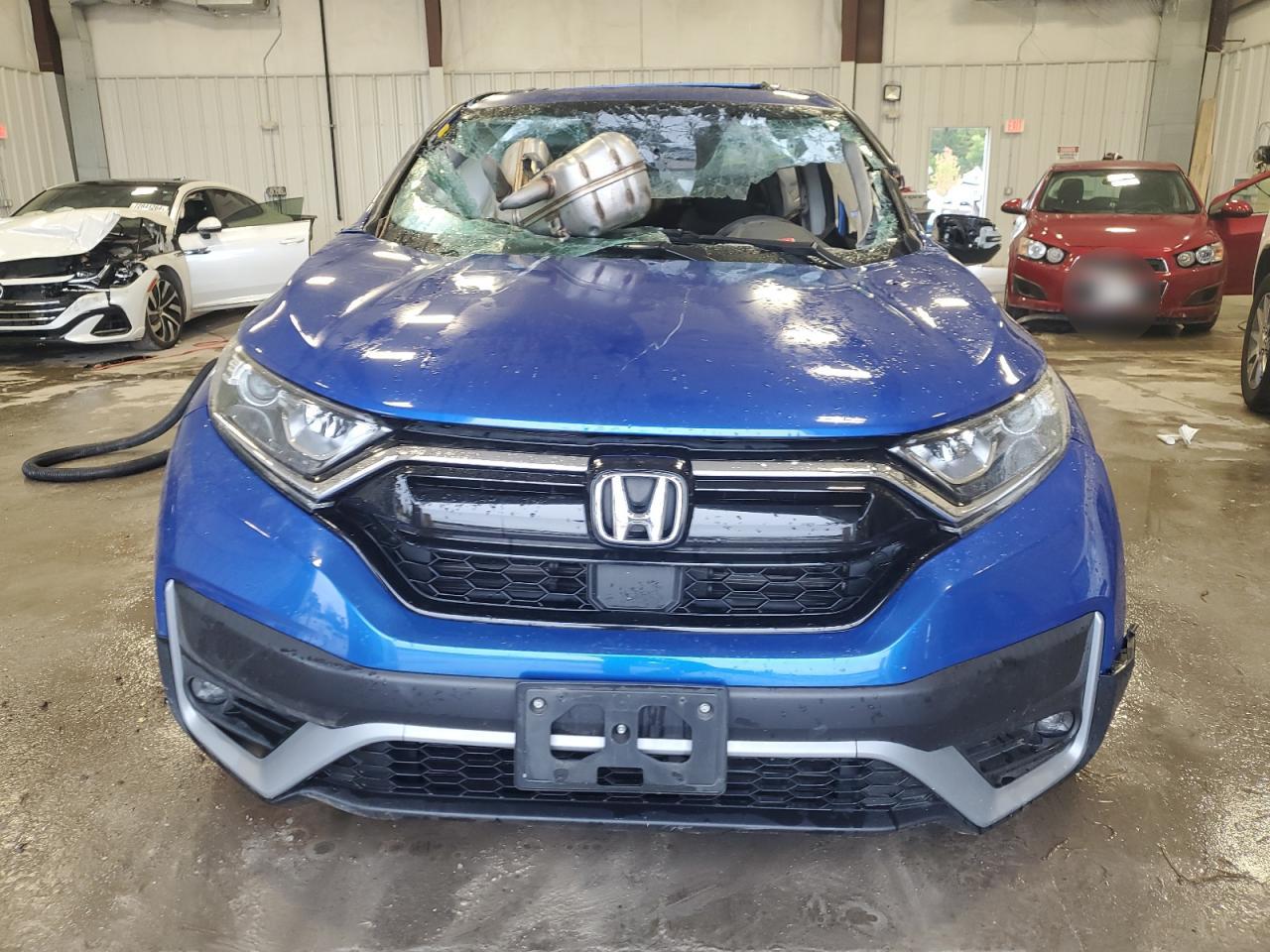 2021 Honda CR-V VIN 7FARW2H58ME016122 Copart auction photo, all over damage thumbnail 5