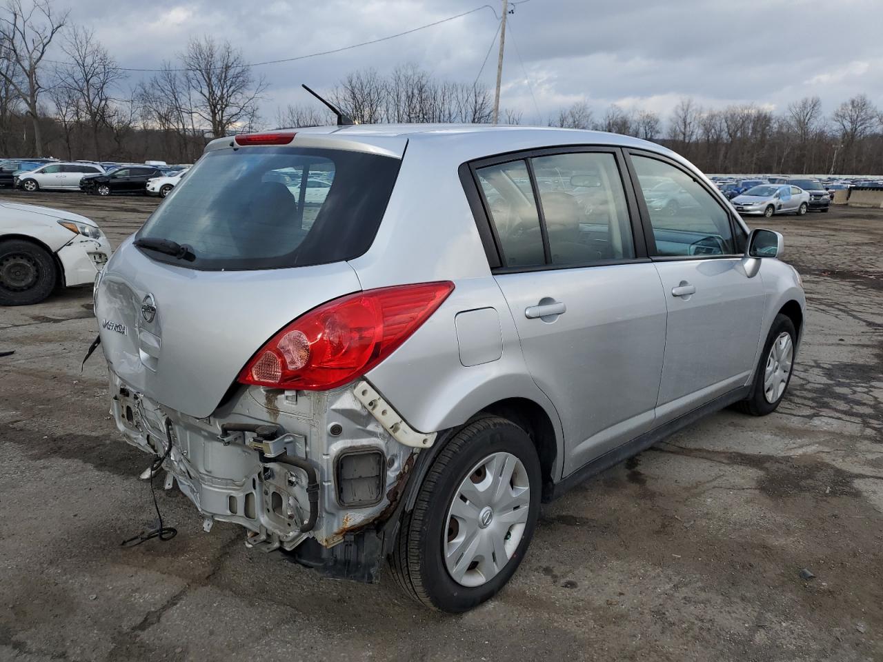 2011 Nissan Versa VIN 3N1BC1CP7BL426596 Copart auction photo, rear end / minor dent/scratches damage thumbnail 3