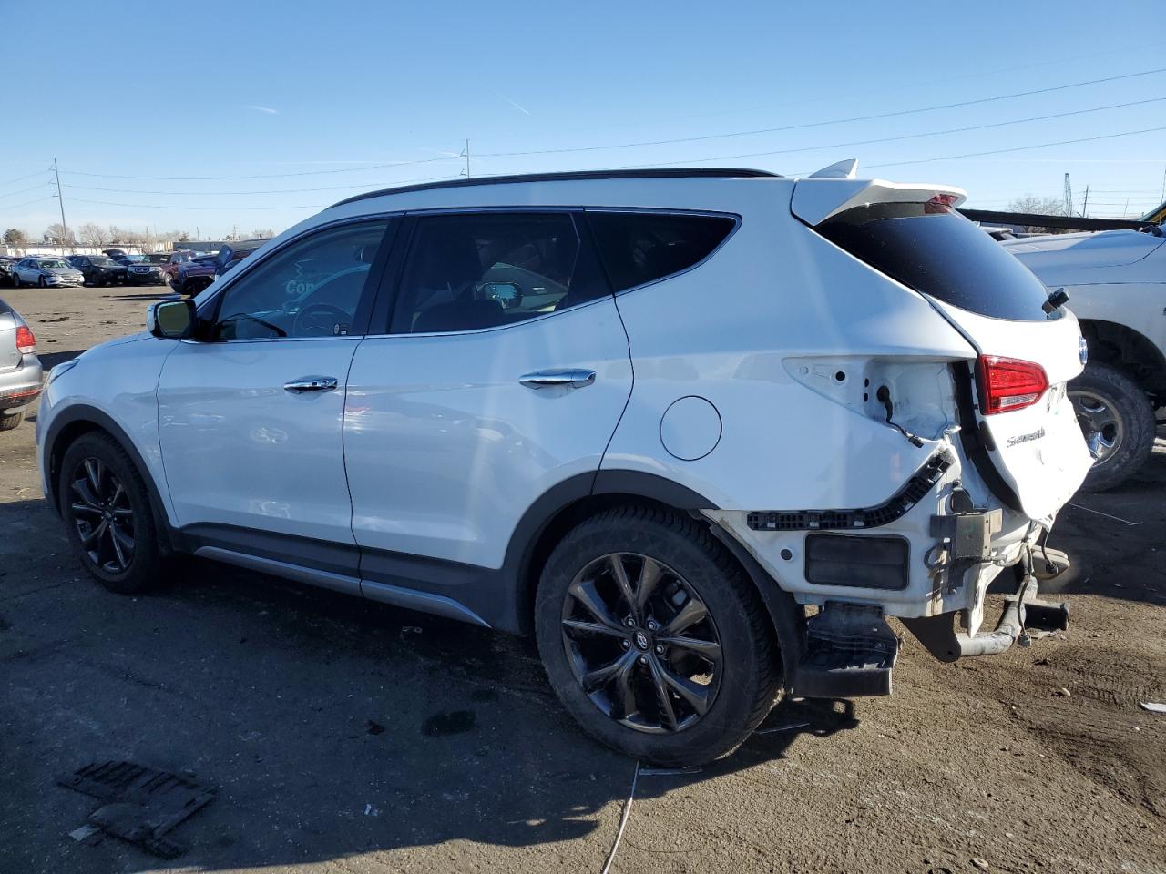 2018 Hyundai Santa Fe VIN 5XYZWDLA5JG511572 Copart auction photo, rear end damage thumbnail 2