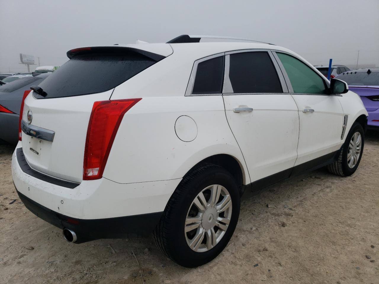 2012 Cadillac SRX VIN 3GYFNAE35CS549477 Copart auction photo, front end / minor dent/scratches damage thumbnail 3