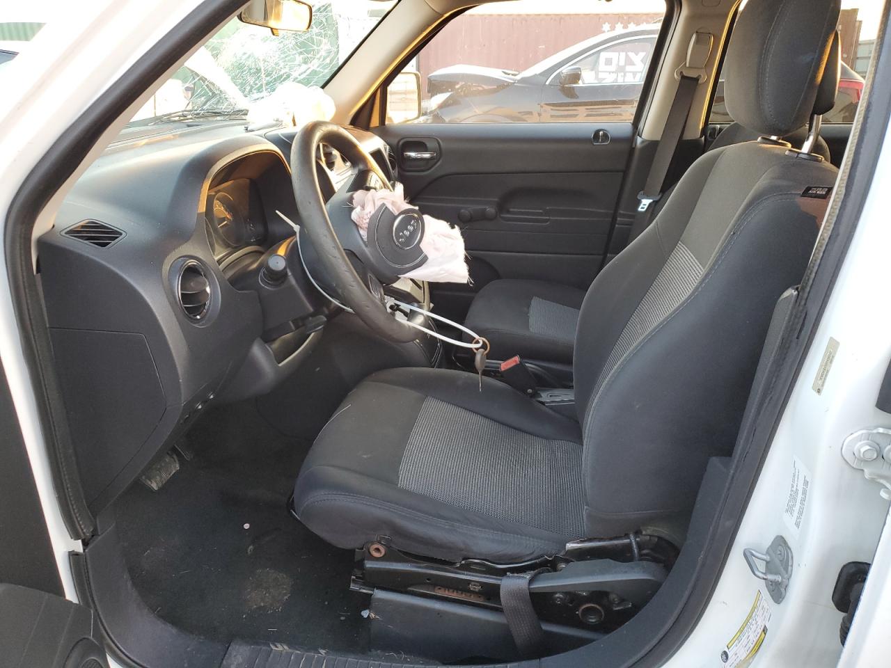 2014 Jeep Liberty (Patriot) VIN 1C4NJPBA4ED696847 Copart auction photo, front end damage thumbnail 7