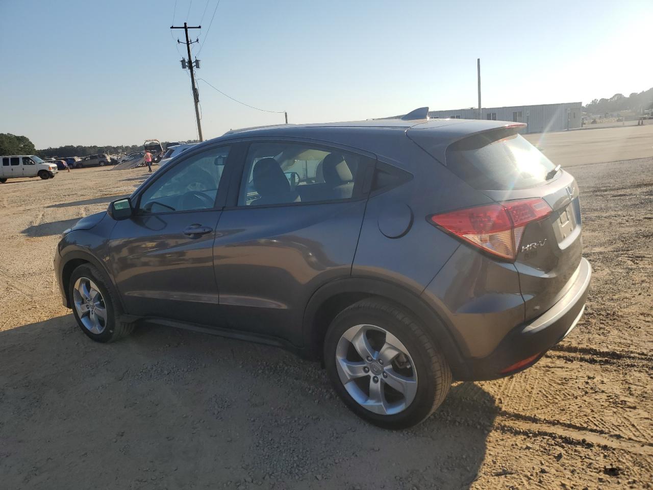 2016 Honda HR-V VIN 3CZRU5H37GM746597 Copart auction photo, side / minor dent/scratches damage thumbnail 2