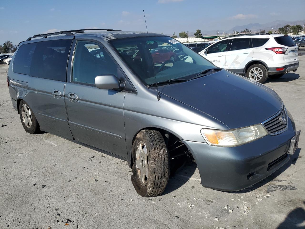 2001 Honda Odyssey VIN 2HKRL18761H520102 Copart auction photo, all over damage thumbnail 4