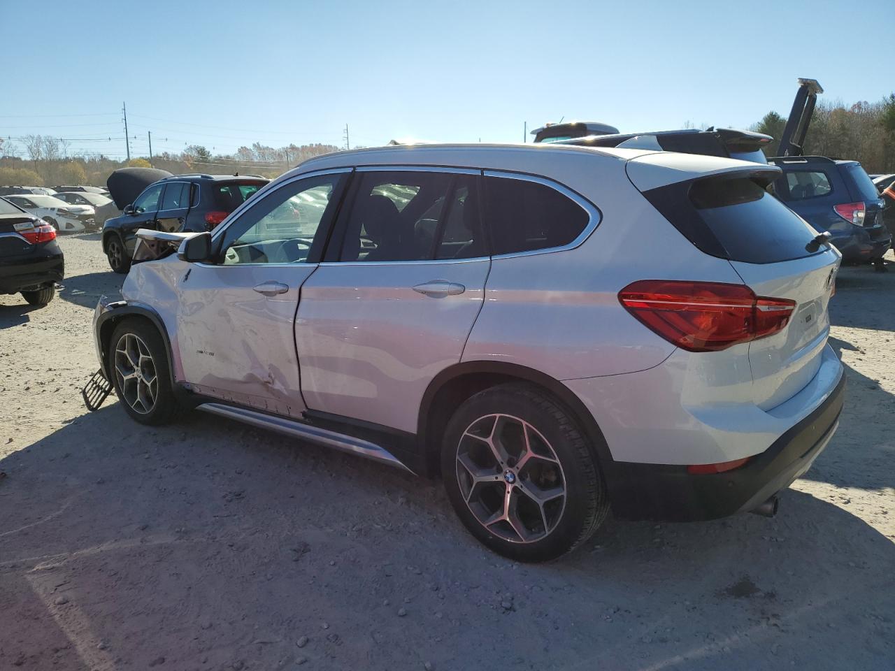 2017 BMW X1 VIN WBXHT3C36H5F78075 Copart auction photo, front end / side damage thumbnail 2
