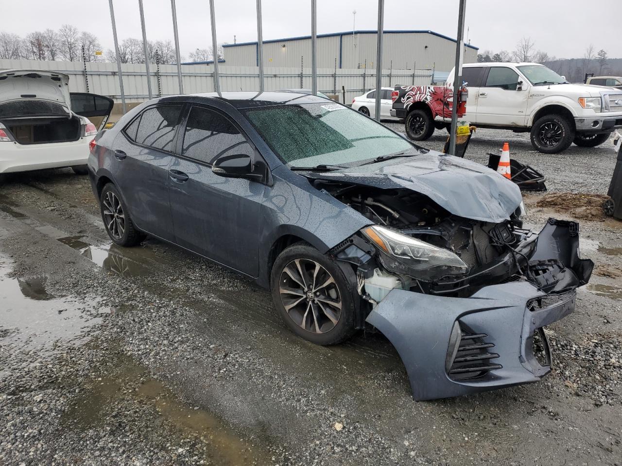 2017 Toyota Corolla VIN 2T1BURHE5HC778801 Copart auction photo, front end damage thumbnail 4