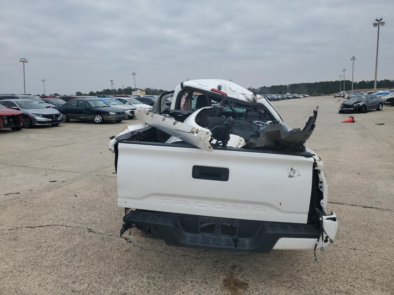 2019 Toyota Tacoma VIN 5TFRX5GN6KX157379 Copart auction photo, all over damage thumbnail 6