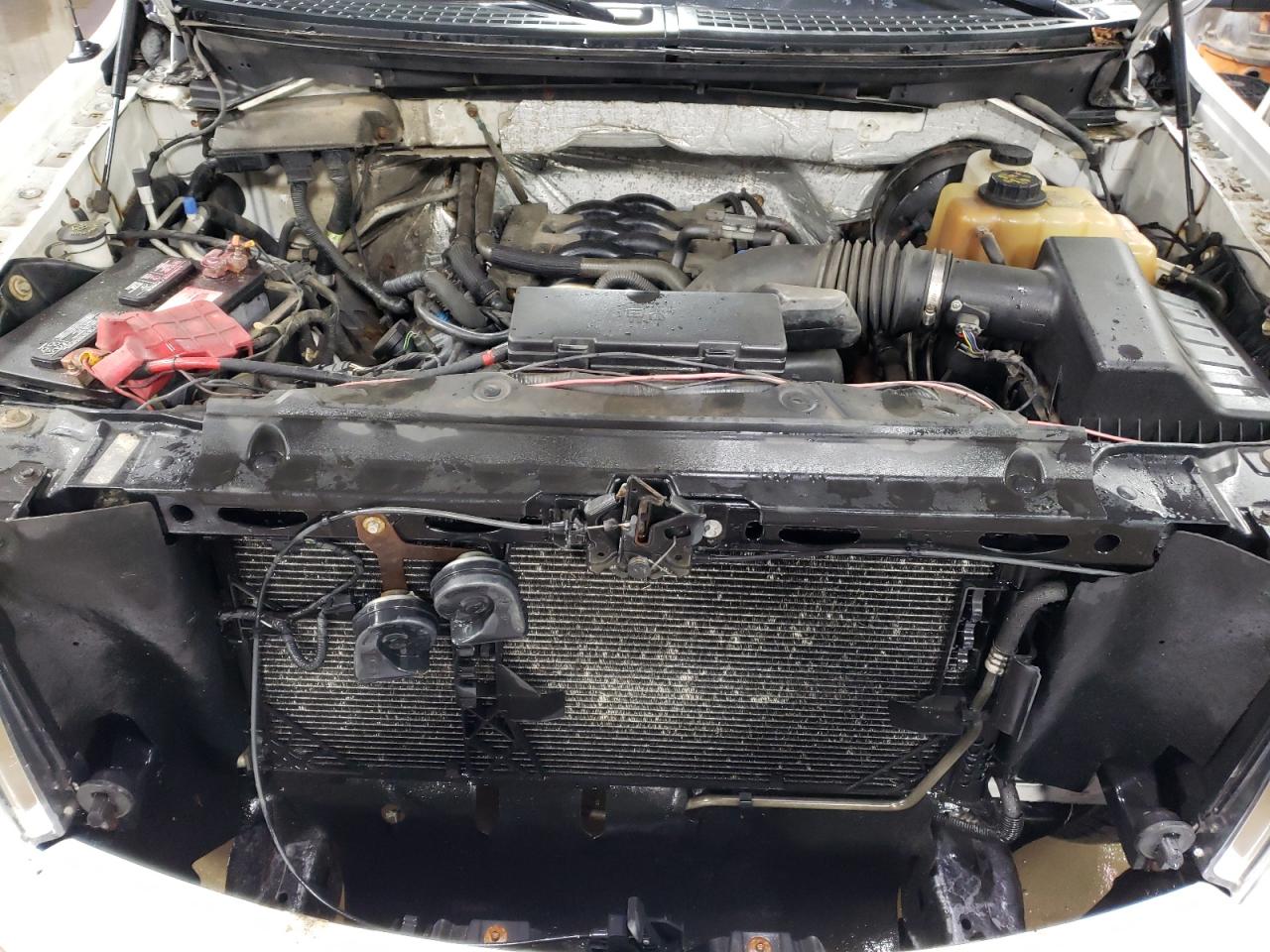 2011 Ford F-150 VIN 1FTNF1CFXBKD39334 Copart auction photo, normal wear damage thumbnail 11