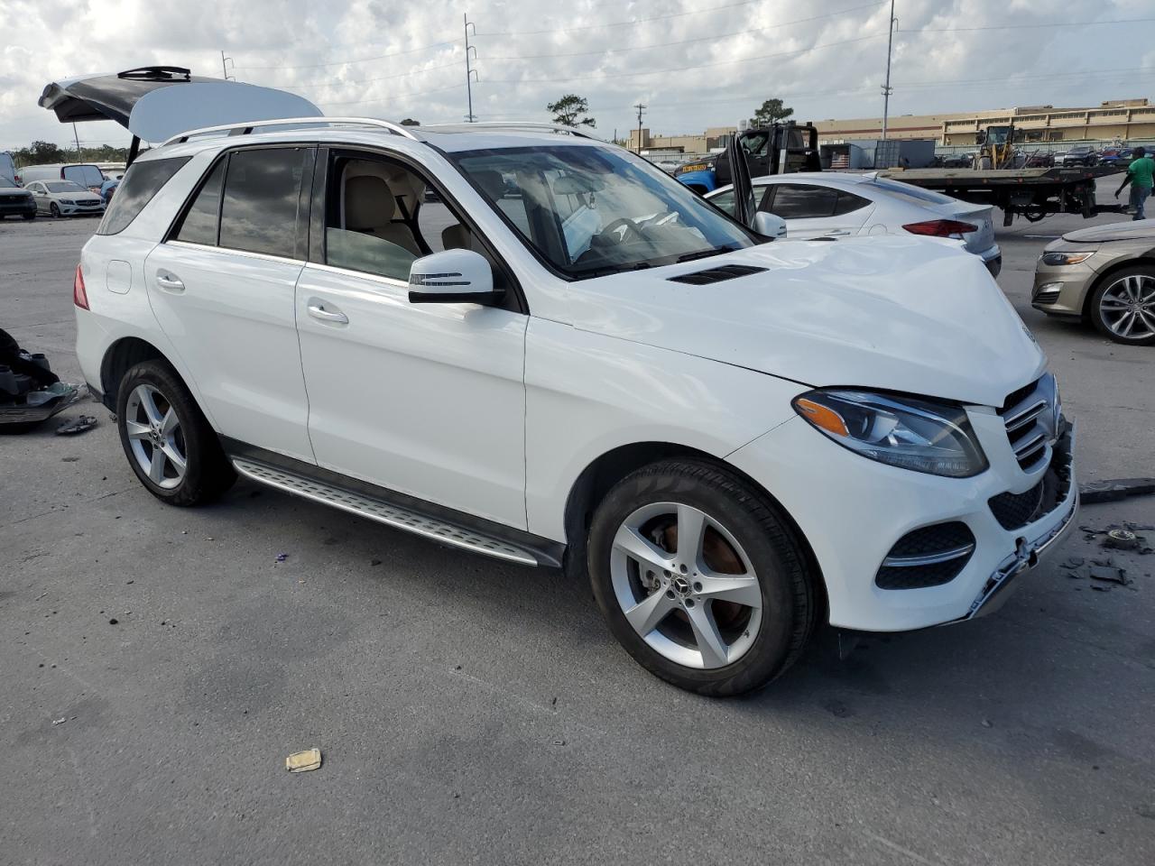 2018 Mercedes-Benz GLE VIN 4JGDA5JB6JB115201 Copart auction photo, front end / side damage thumbnail 4