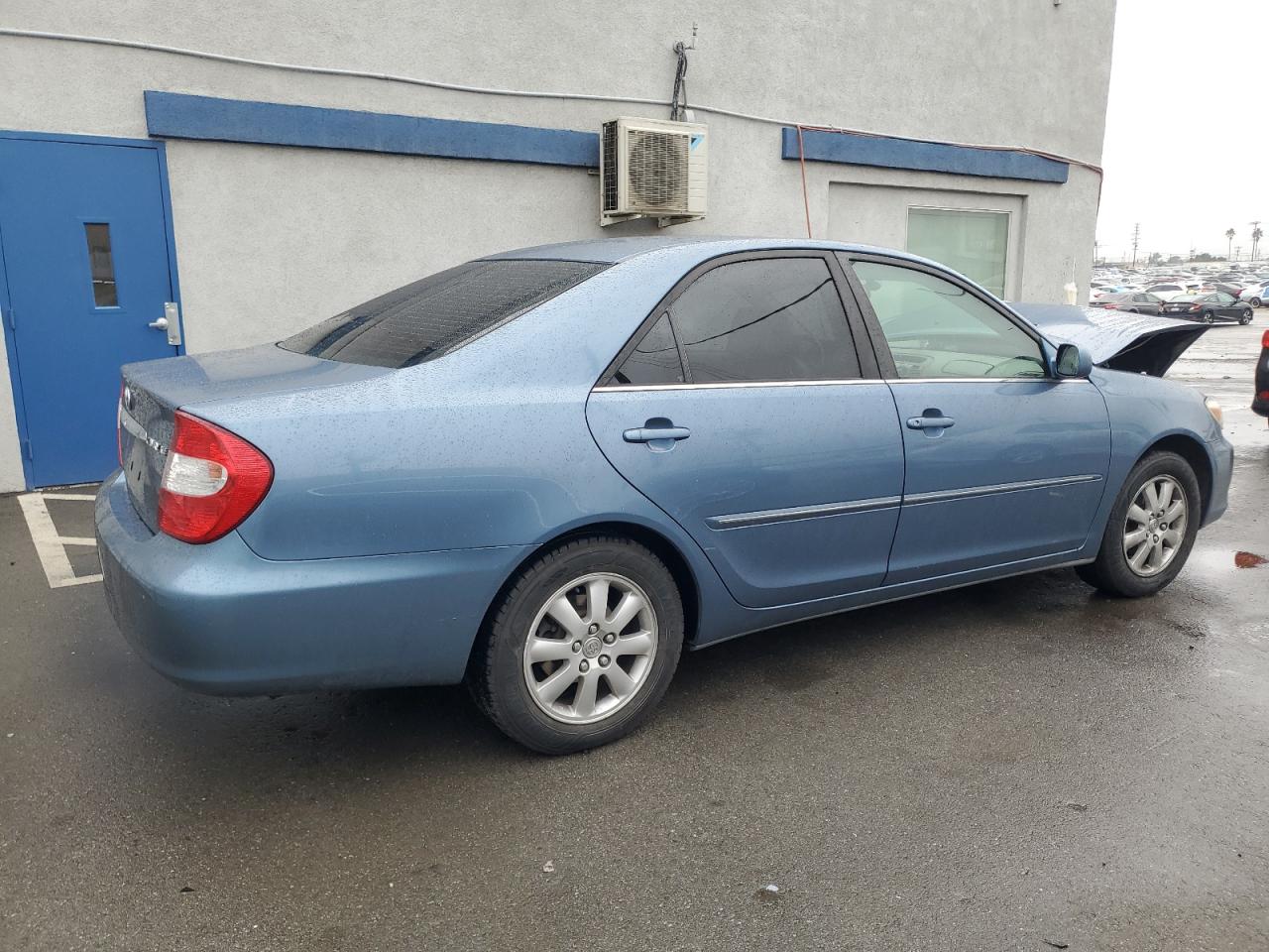2002 Toyota Camry VIN JTDBE30K020055905 Copart auction photo, front end damage thumbnail 3