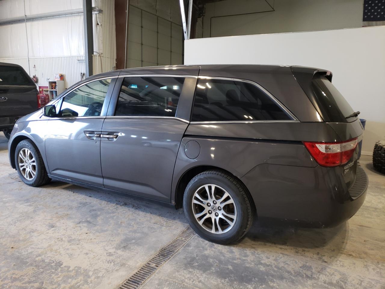 2012 Honda Odyssey VIN 5FNRL5H49CB143960 Copart auction photo, hail / rear end damage thumbnail 2