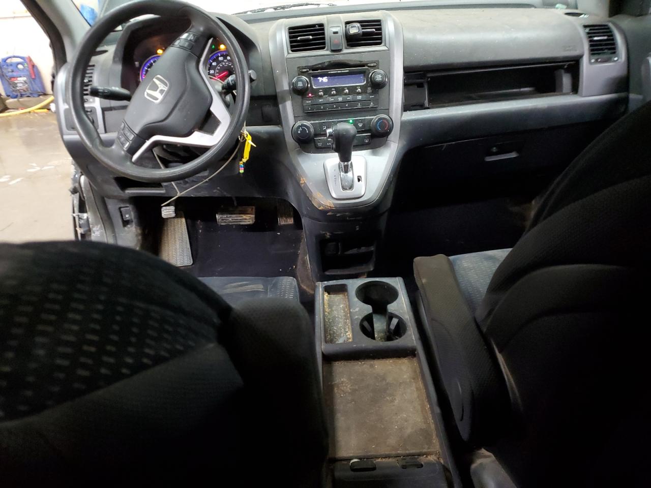 2009 Honda CR-V VIN 3CZRE48589G702862 Copart auction photo, side / front end damage thumbnail 8