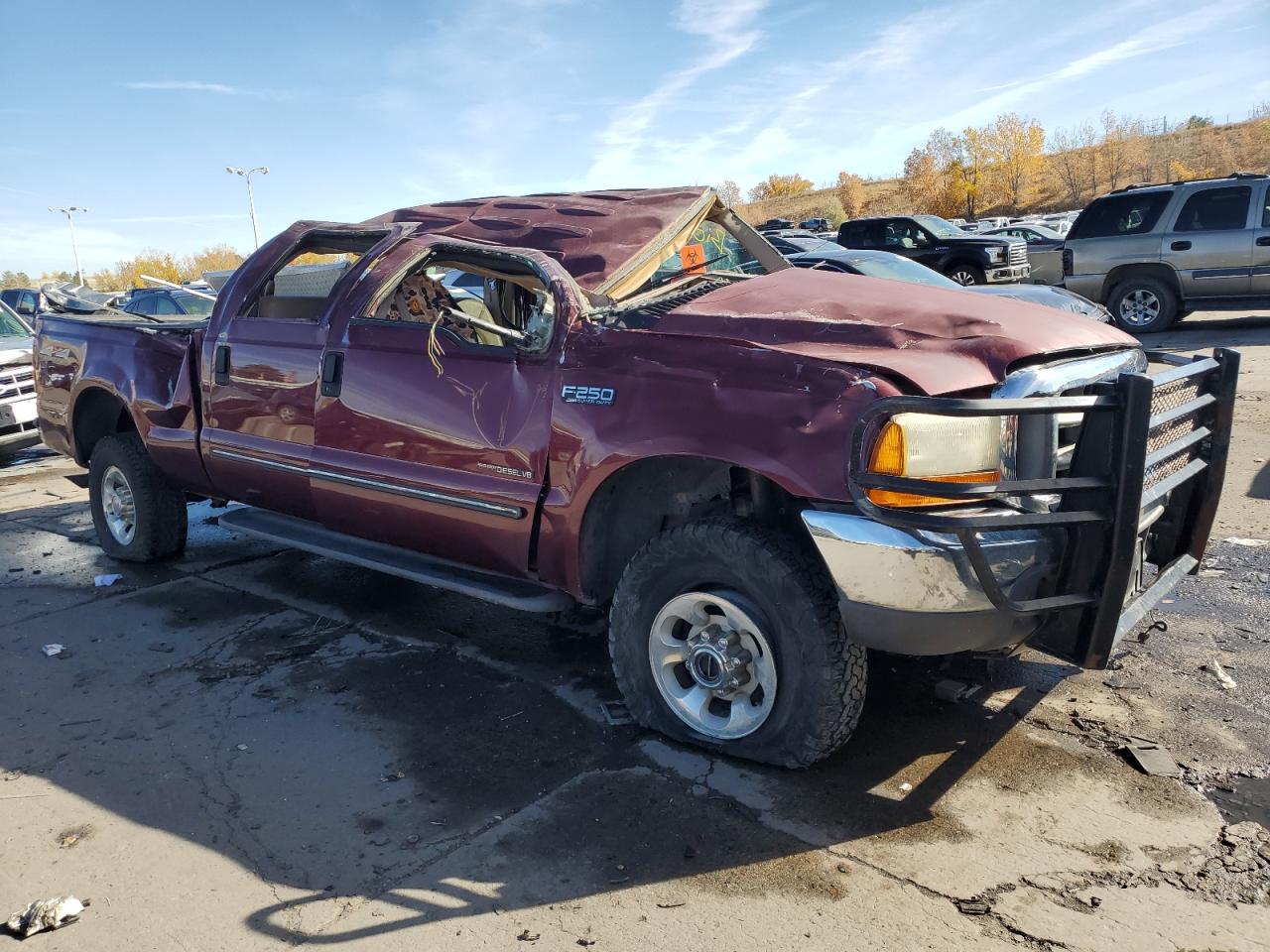 1999 Ford F250 VIN 1FTNW21F7XEE89478 Copart auction photo, rollover damage thumbnail 4