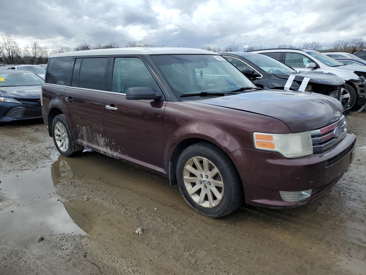 2009 Ford Flex VIN 2FMEK62C19BA01370 Copart auction photo, front end / side damage thumbnail 4