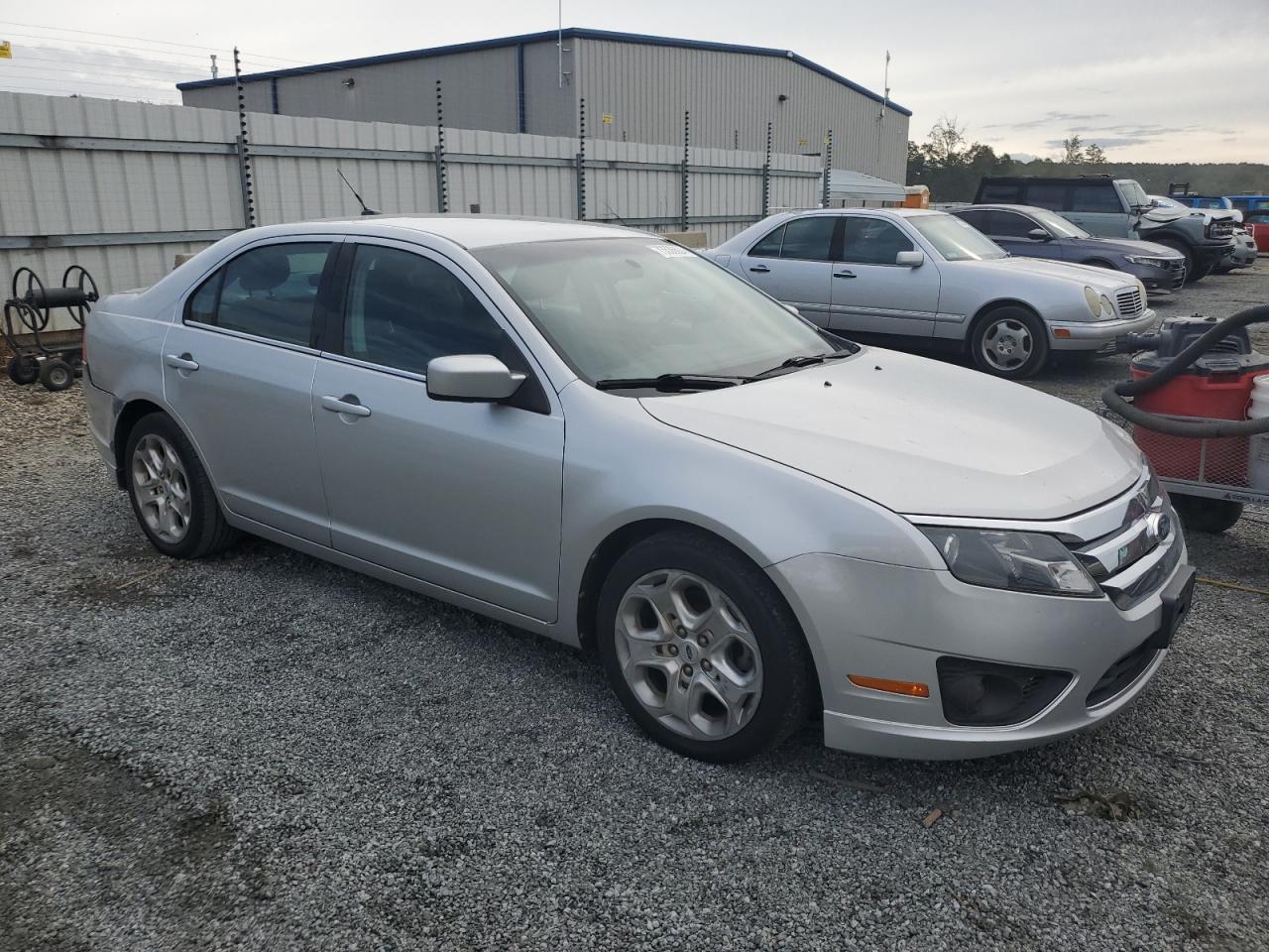 2011 Ford Fusion VIN 3FAHP0HA6BR246474 Copart auction photo, side / all over damage thumbnail 4