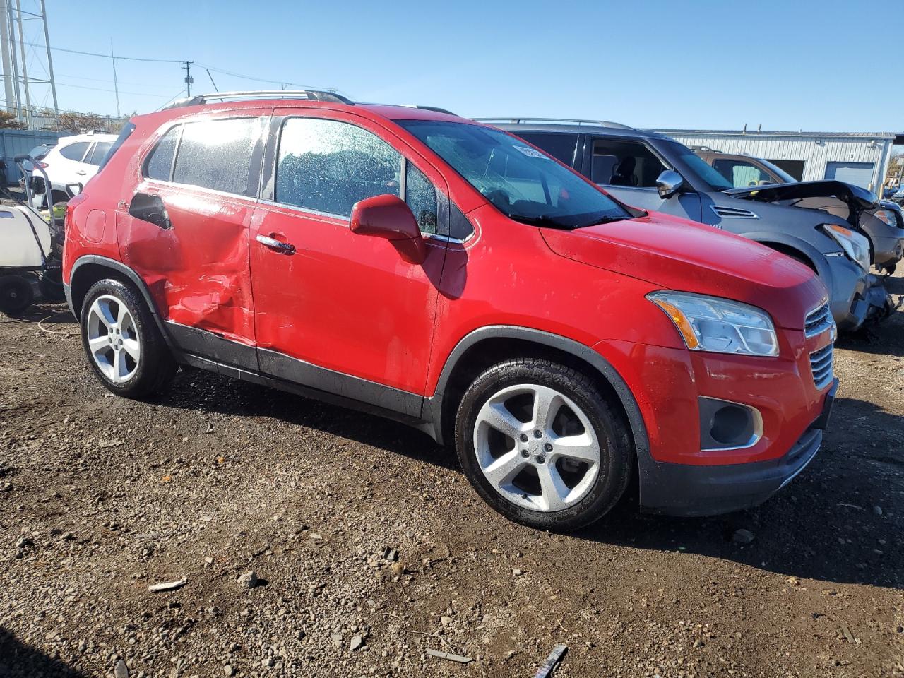 2015 Chevrolet Trax VIN 3GNCJNSBXFL246479 Copart auction photo, side damage thumbnail 4