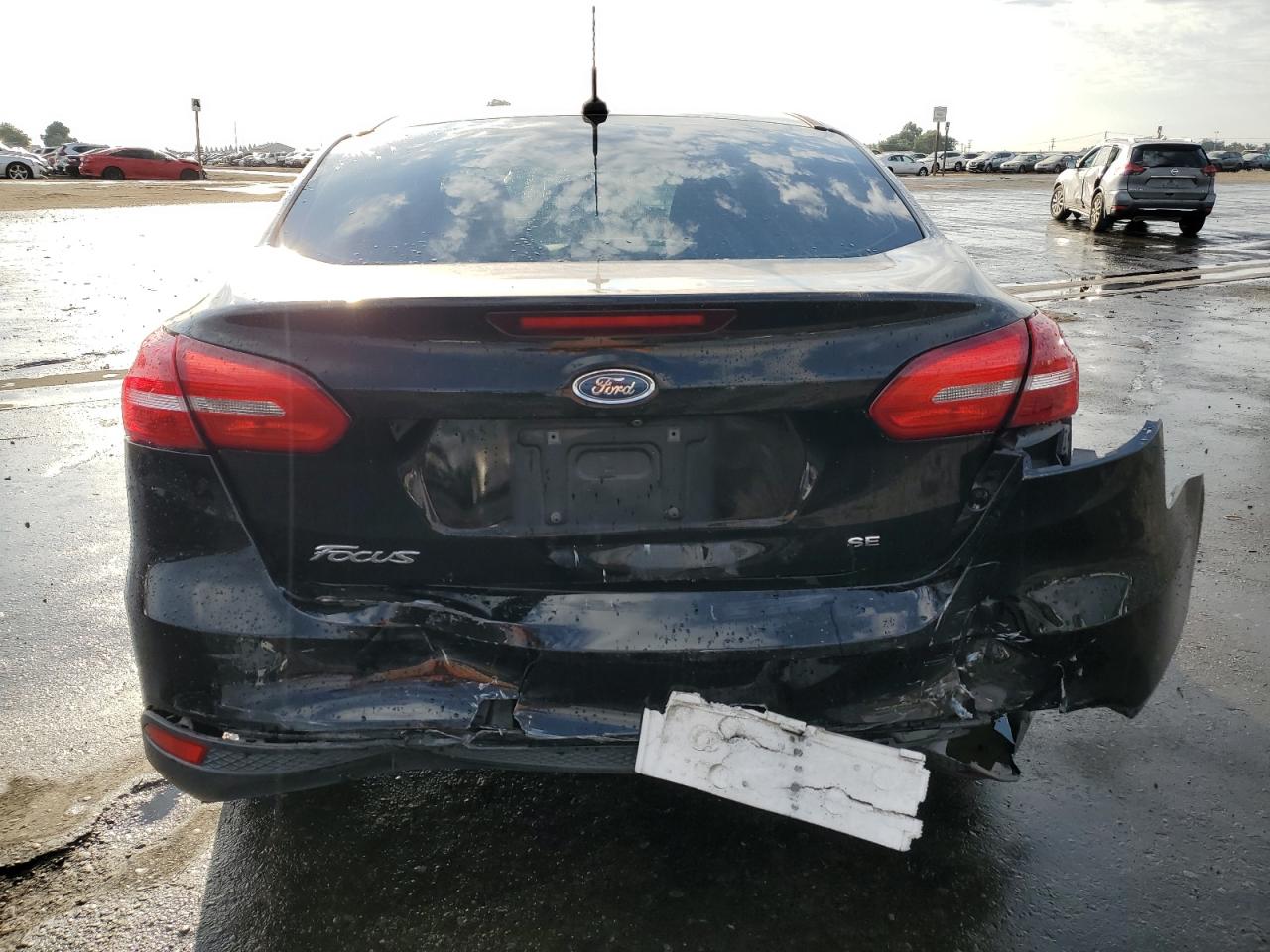 2016 Ford Focus VIN 1FADP3F23GL379954 Copart auction photo, front end / rear end damage thumbnail 6