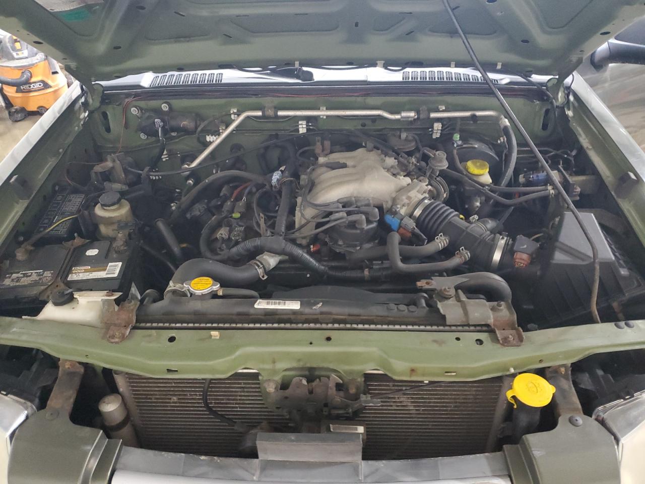2003 Nissan Navara (Frontier) VIN 1N6ED27Y43C461932 Copart auction photo, side / front end damage thumbnail 11