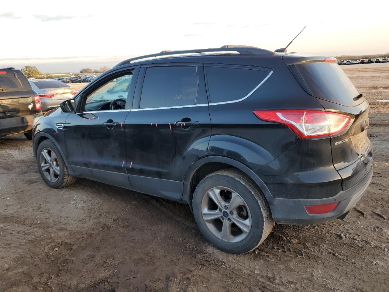 2014 Ford Escape VIN 1FMCU9GXXEUC61463 Copart auction photo, side / minor dent/scratches damage thumbnail 2