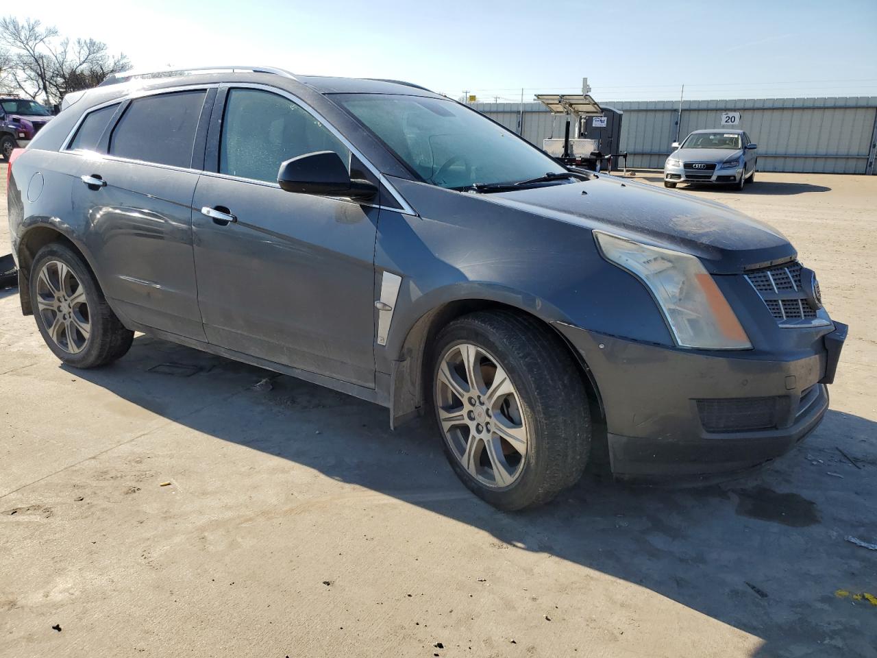 2012 Cadillac SRX VIN 3GYFNAE30CS543425 Copart auction photo, all over damage thumbnail 4